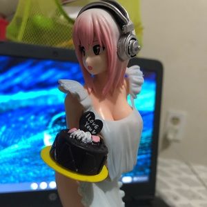 Super Sonico holding a Birthday cake skytube